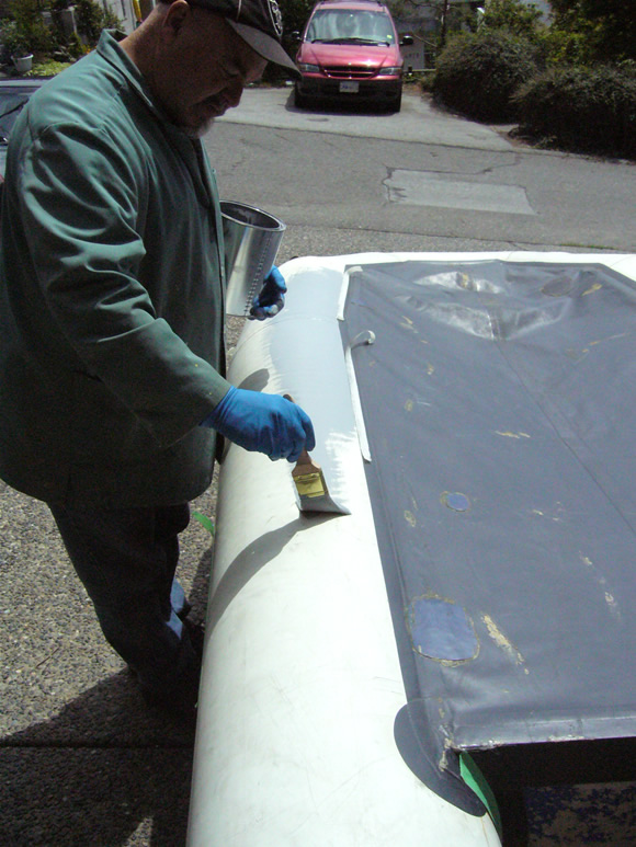 Inflatable boat paint restoration